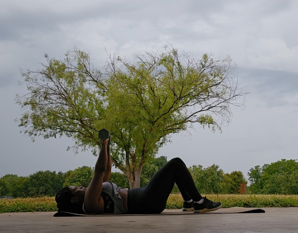 woman performing upper body workout