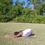 african american woman doing child's pose yoga for relaxation