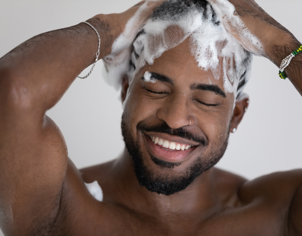 african american man shampoo hair